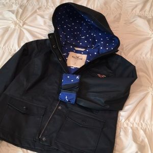 Hollister Navy Blue short raincoat. Size small.